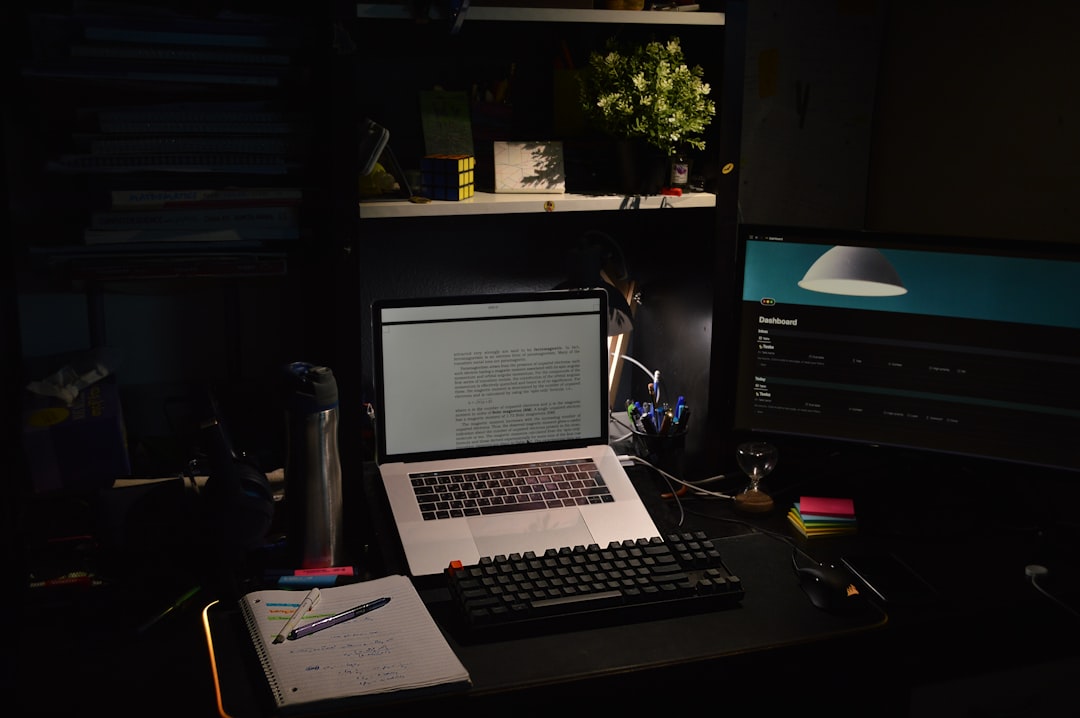 a laptop sits on a desk